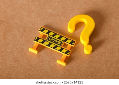 A yellow question mark next to a 