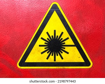 Yellow Radiation Hazard Sign On Red Background