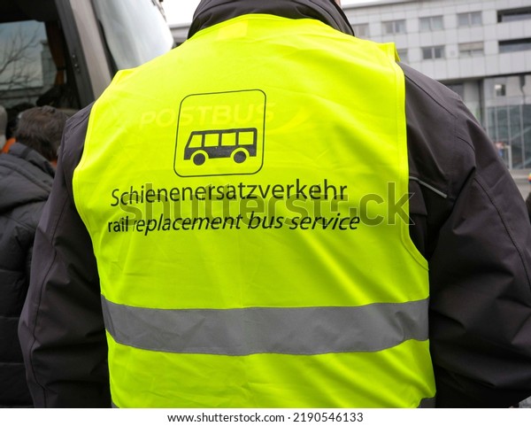 yellow rail\
replacement bus service sign, black letters and pictogram, english\
and german\
(Schienenersatzverkehr)