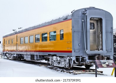 Yellow Railroad Dining Car In The Snow