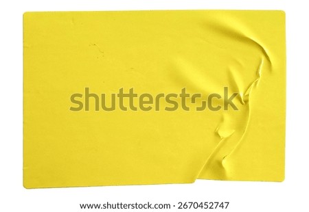 Yellow rectangular paper sticker label isolated on white.