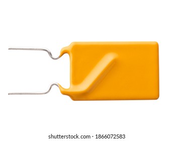 Yellow Rectangular Polyester Film Capacitor Isolated. Electronic Components. Close-up. Top View. 