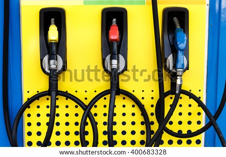 Yellow ,red and blue of fuel nozzle, difference color symbol for  benzine,gasoline and diesel.