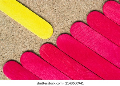 Yellow And Red Color Wooden Stick On Wooden Desk.Flat Lay. Directly Above. Copy Space.