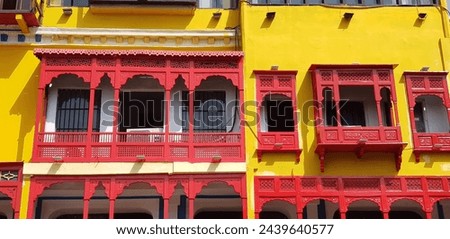 Yellow and Red old building in Lahore