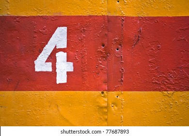 Yellow And Red Painted Metal Texture With White Digit 4