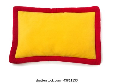 Yellow - Red Plush Pillow Isolated On White