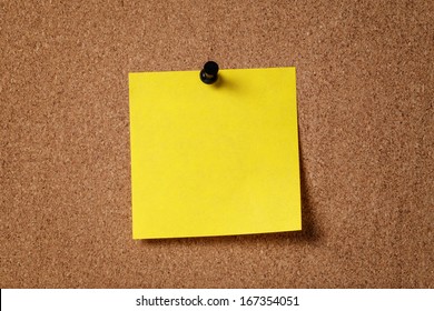 yellow reminder sticky note on cork board, empty space for text - Shutterstock ID 167354051