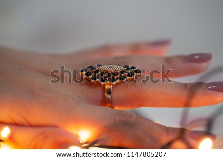 Yellow ring woman hand