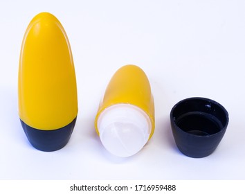 Yellow roll on deodorant on white background - Shutterstock ID 1716959488