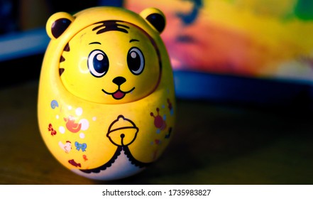 A Yellow Roly Poly Toy