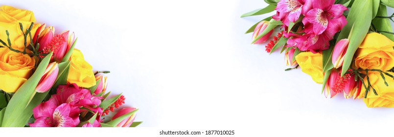 Yellow roses and pink tulips on a white background are a festive floral arrangement. Spring bouquet. Background for greeting card, invitation. - Shutterstock ID 1877010025