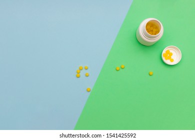 Yellow Round Jelly Beans Vitamins On Colored Background