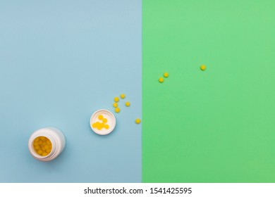 Yellow Round Jelly Beans Vitamins On Colored Background