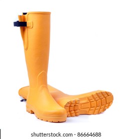 yellow rubber boots for women on white background