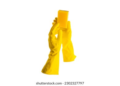 Yellow rubber cleaning gloves holding sponge isolated on white background. Place for text. Professional cleaning concept. High quality photo