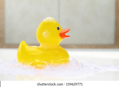 Yellow Rubber Duck In Bath Foam