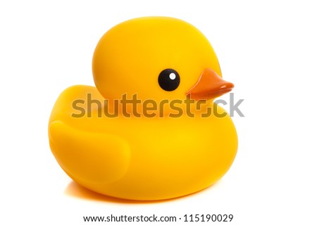 Yellow rubber duck - bath toys on a white background