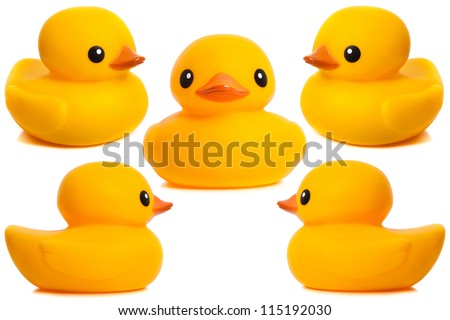 Yellow rubber duck - bath toys on a white background