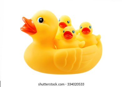Yellow rubber duck and little ducky isolated on white background