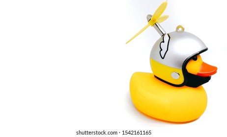 Yellow Rubber Duck In A Silver Helmet. Bicycle Flashlight. Bicycle Lamp

