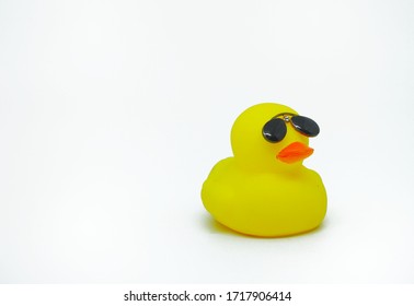 Yellow Rubber Duck Toy That Uses Glasses