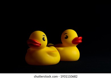 Yellow Rubber Ducks With Black Background.