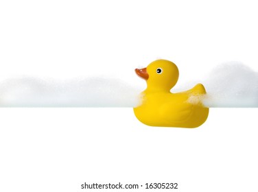 Yellow Rubber Ducky Swimming In Bubble Bath, Isolated On White Background