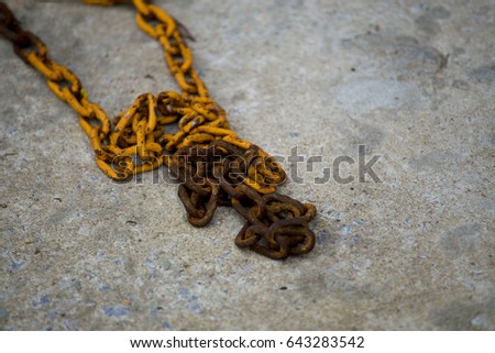 Yellow rusted chain.
