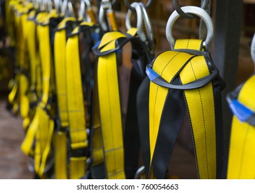 Yellow safety harness for climbing - Shutterstock ID 760054663