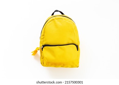 Yellow school backpack. Back to school concept. Top view