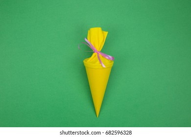 Yellow School Cone On Green Background