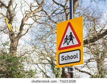 A Yellow School Road Sign, UK.