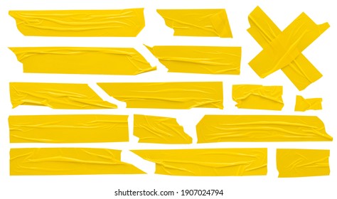 Yellow scotch, set of self-adhesive adhesive tape strips of various shapes and sizes on white background