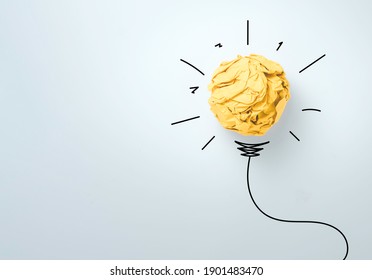 Yellow Scrap Paper Ball With Illustration Painting For Virtual Lightbulb. It Is Creative Thinking Idea And Innovation Concept.