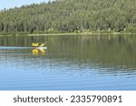 Yellow seaplane at Lake Mary Ronan in MT