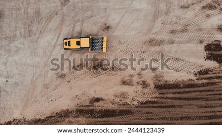 Yellow Sheep Foot Roller at the construction site  to Compact the Ground Before Construction