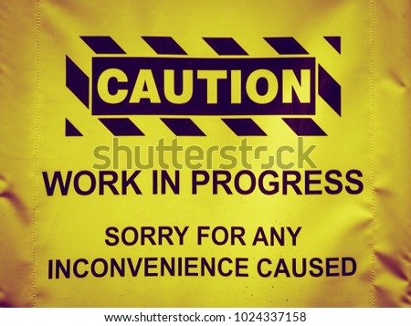 yellow sign of working area caution, black copy print on vinyl Stock photo © 
