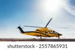 yellow sikorsky commercial helicopter landing 