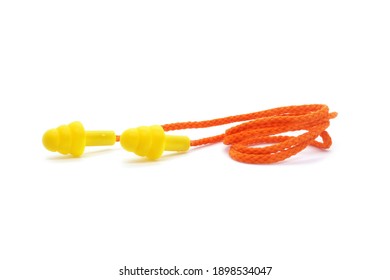 Yellow Silicone Earplugs With Cord Isolated On White Background. Noise Isolation And Protection. Close-up.