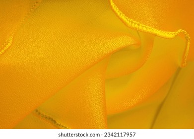 Yellow silk organza with wavy piping. Border around the edge of the fabric. Abstract background. texture pattern. Silk organza has a delicate open weave. Wave background. Copy space - Shutterstock ID 2342117957