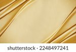 Yellow silk satin. Draped fabric. golden color. Luxury background. Space for design. Template. Flat lay, top view table.Web banner. Christmas,wedding,bridal,beauty, valentine, romance, award, reward.