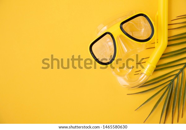 Download Yellow Snorkel Diving Mask On Yellow Nature Stock Image 1465580630 PSD Mockup Templates