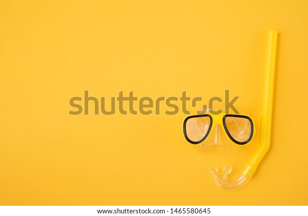 Download Yellow Snorkel Diving Mask On Yellow Nature Stock Image 1465580645 PSD Mockup Templates
