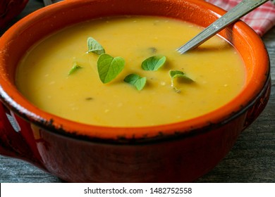 Yellow Split Pea Soup In Clay Bowl. Close Up.