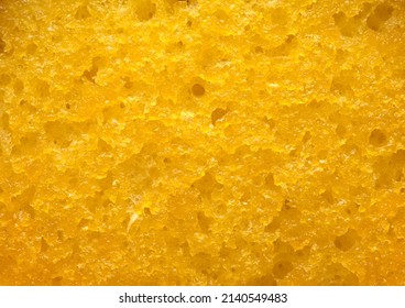 Yellow Sponge Cake Close Up Background Texture.