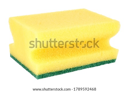 Yellow sponge for washing dishes close-up isolated on white background