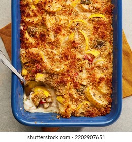 Yellow Squash Casserole With Spoon
