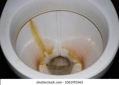 Yellow stain for long time on flush toilet.