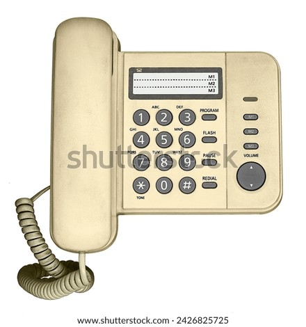 A yellow stationary telephone (year 2010) with number buttons and a twisted wire